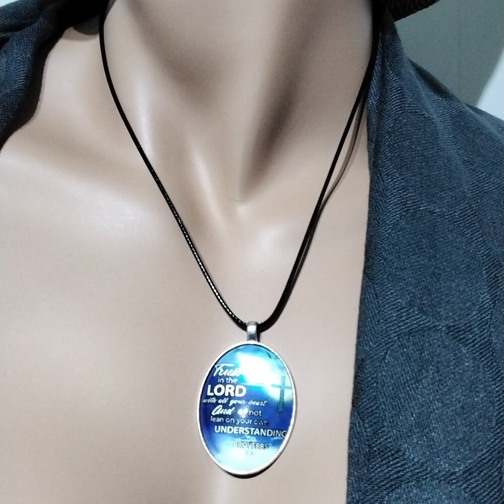 NEW - Woman Trust in the Lord silver tone oval pendant leather cord necklace